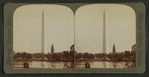 Washington Monument (555 ft. high) from N.W.) across one of the Fish Ponds, Washington, U.S.A..