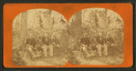 Three gentlemen pose on rustic bench, each holding a walking stick.