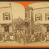 People posing with alligators in front of Eggleston's Florida shell store.