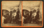 Group of men and women on the stairway.