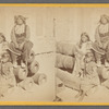 Black Horse, wife and child in Native costume, confined in Fort Marion, St. Augustine, Florida