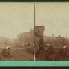 Union depot showing a locomotive leaving the station.