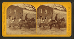 View of a man in mule cart in front of a home.