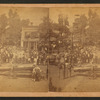 4th of July [1896] celebration in Marengo showing clowns with cannon, simple ferris wheel.