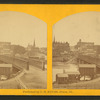[View of bridge leading to business district.]