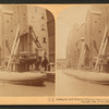 Loading the great whaleback ship at the famous grain elevators, Chicago, U.S.A.