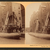 Loading the great whaleback ship at the famous grain elevators, Chicago, U.S.A.