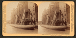 Loading the great whaleback ship at the famous grain elevators, Chicago, U.S.A.