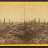 General view of the ruins from Tribune Building, Booksellers Row  in the centre.