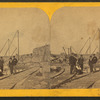Railroad workers at a railroad construction area.