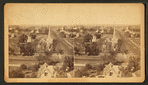 General view showing a church and homes.
