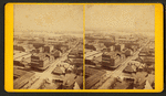 General bird's-eye view showing buildings, houses, and the river.