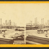 Steamboat landing, from Bienville street, looking up the levee, with the upper shipping in the far distance.