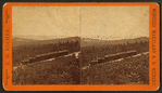 [A view of a train in the western Maryland hills.]