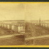 Right side of grounds, looking from top of new building, showing a portion of the officer's quarters, the chapel and library.