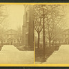 In front of the chapel, showing the library in the background.