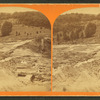 Reservoir dam looking east, showing the break.
