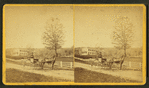 Collins Graves in the milk wagon he drove to warn villagers downstream.