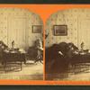 Mrs. Metcalf, principal at Norton Seminary reading in her parlor.