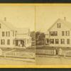 "Two tenement" in Thorndike with owners at gate.