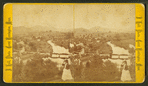View of a woman looking into the distance with binoculars above Glendale, showing a bridge, a mill, and homes below.