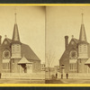 Three men standing in front of a church.