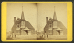 Three men standing in front of a church.