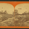 Group and their tents on rocky beach, at or near East Weymouth.