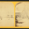 View of a snowy farm yard.