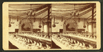 View of a banquet set in honor of the incorporation of South Abington, tables set, room decorated with streamers.