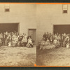 Large family (?) group of over 70 people in front of a barn in Clinton.