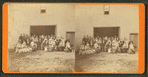 Large family (?) group of over 70 people in front of a barn in Clinton.