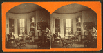Parlor in Upton, looking toward shuttered bay window, chairs, table, and statuette visible.
