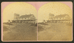 Summit house on Mt. Wachusett showing large addition and guests on porch.
