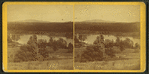 View of a lake or river from a farm.