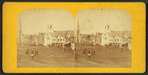 East side of the Commons, showing churches, people, wagons and businesses.