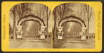 Triumphal arch over road to battle ground.