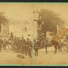 Fire fighting equipment, hose cart and men in uniform.