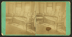 Interior view showing two chairs and a settee.