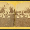 Playing croquet.