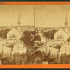 General view showing homes and churches.