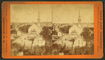 General view showing homes and churches.