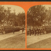 Men in uniform, some with drums.