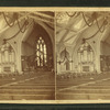 [An interior view of a church on its twentieth anniversary in 1879 showing decorations.]