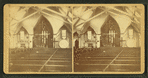 An interior view of a church on its twentieth anniversary in 1879 showing decorations.