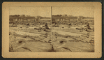 Connecticut River Dam at low water, boys posing on rocks in foreground.