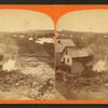 View of a home, people posing on the steps.