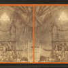 Decorated altar, pastor at lectern, choir and organ behind him, unidentified church.