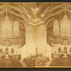 Interior view of altar, choir loft and organ at unidentified church.