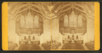Interior view of altar, choir loft and organ at unidentified church.